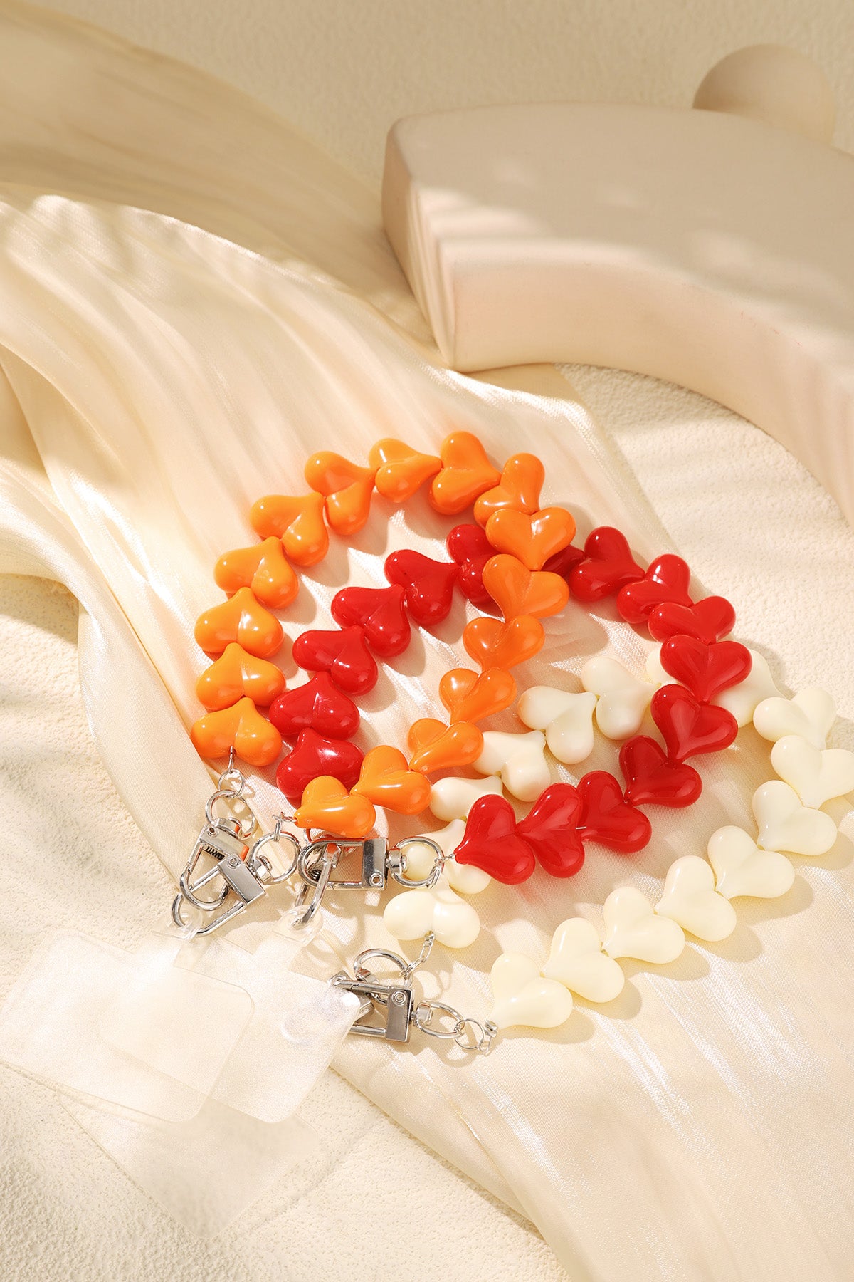 Telefoonkoord hartjes Oranje