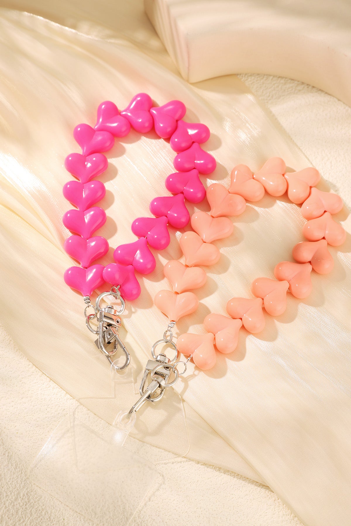 Telefoonkoord hartjes Roze