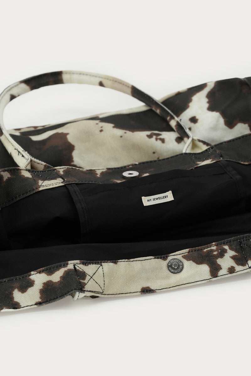 Bruine shopper met koeienprint
